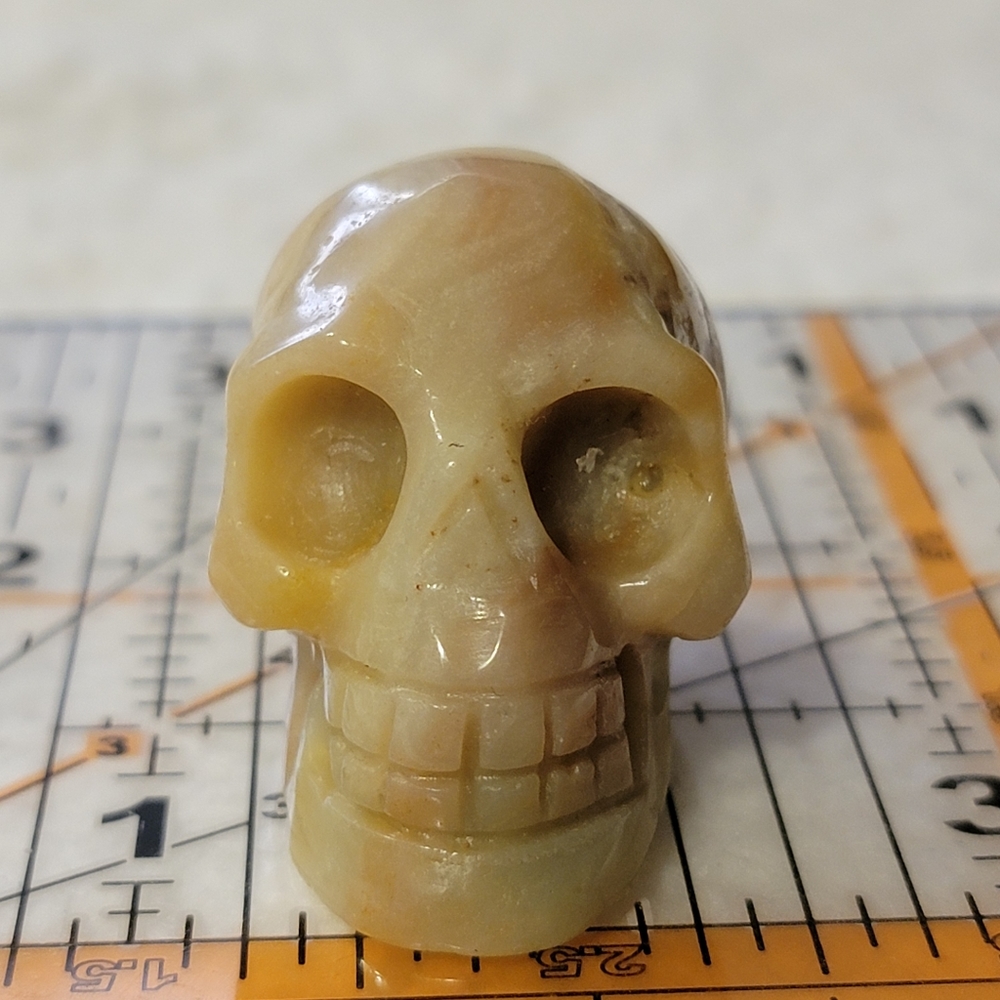 Green and yellow jasper skull